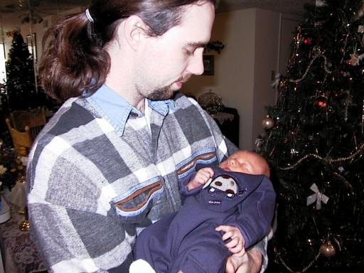 me holding 4-day-old Logan