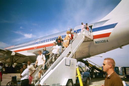 the team getting off the plane