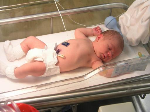 newborn Owen in bassinet